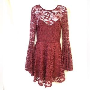 Material Girl bell sleeved lace dress